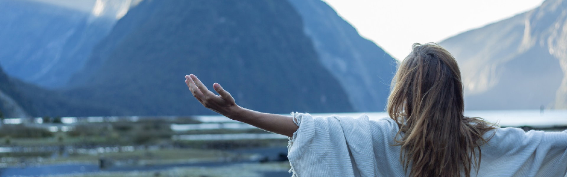 empowering, serene image of a woman looking confident and relaxed, with soft natural lighting